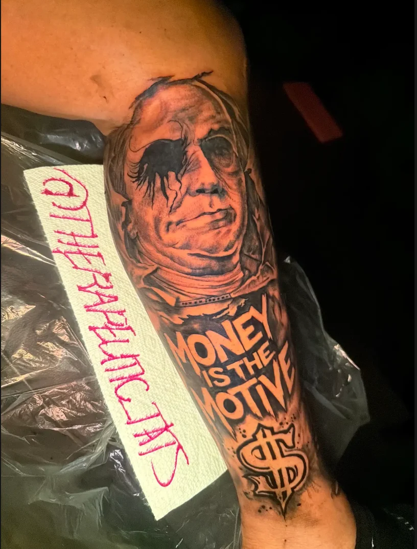 Realistic portrait and bold lettering forearm tattoo by Therapeutic Tats